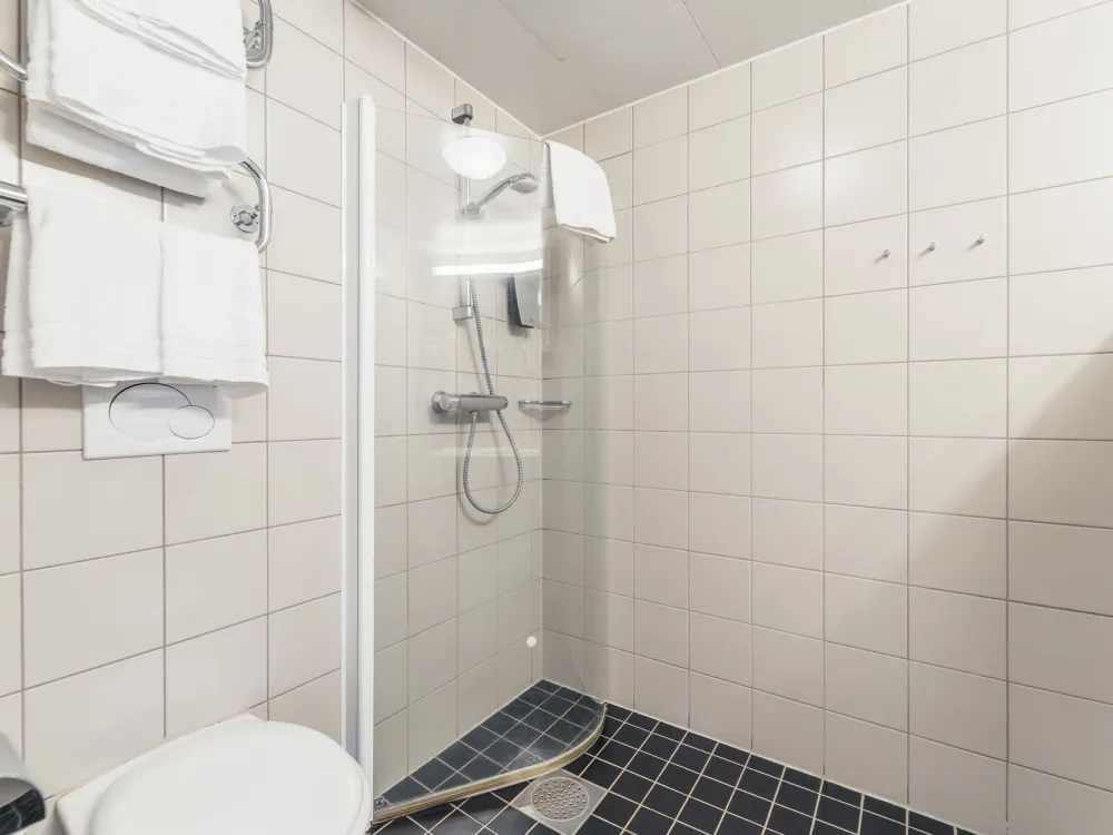 Dubbelrum med balkong och fjällutsikt på Pernilla Wiberg Hotel