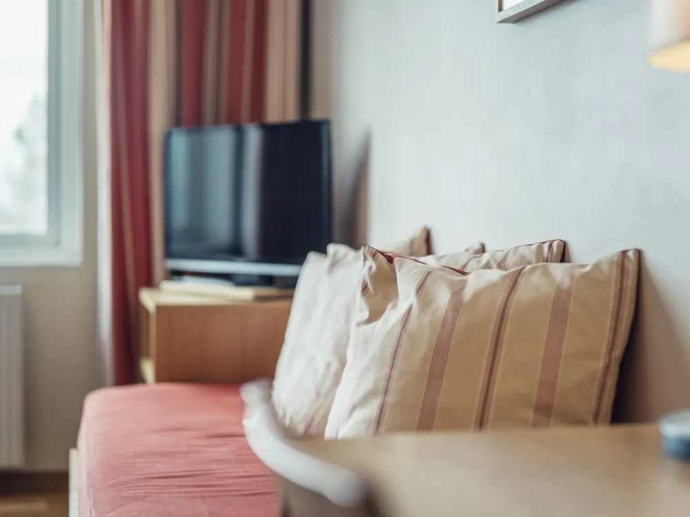 Dubbelrum med balkong och fjällutsikt på Pernilla Wiberg Hotel